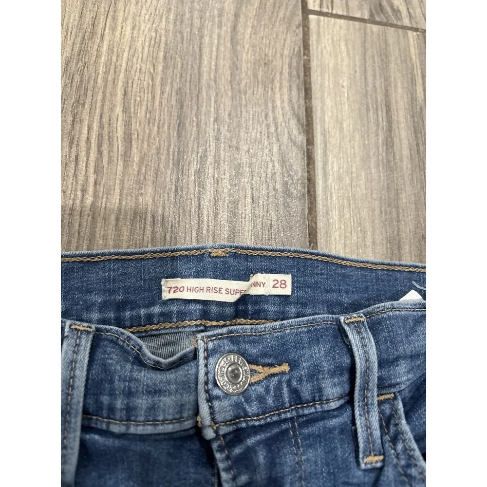 Levi's 720 High Rise Super Skinny Jeans Women's Size 28 Distressed Raw Hem Blue